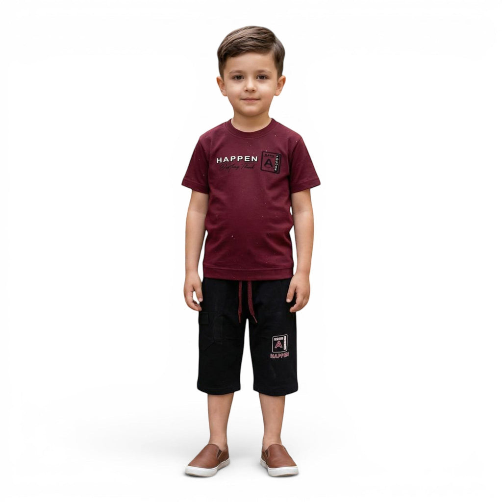 Mini & Mama boys burgundy cotton t-shirt with graphic detail and black shorts with drawstring elastic waist.
