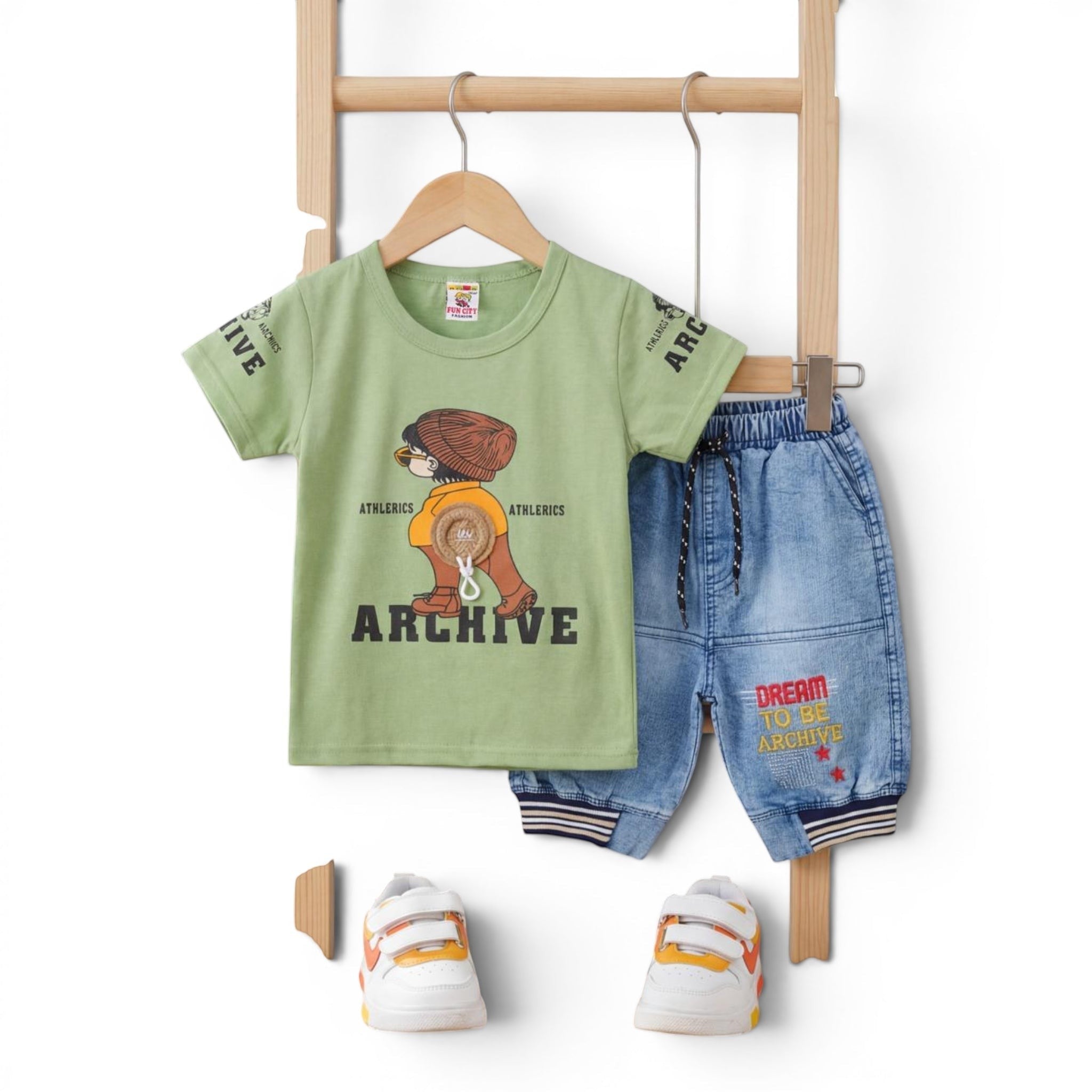 Mini & Mama Boys green cotton graphic t-shirt with "ARCHIVE" text and denim shorts with drawstring waist.