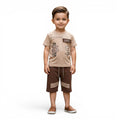Mini & Mama boys' beige graphic print t-shirt with "SMART" accents and brown drawstring shorts with "SMART" patches.