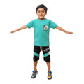 Mini & Mama boys turquoise graphic t-shirt with speckle detail and black color-blocked shorts.