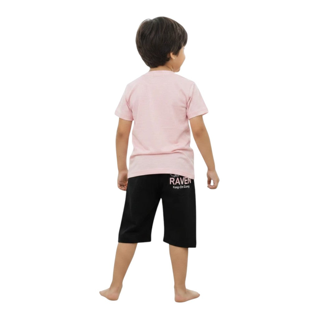 Mini & Mama Boys pink t-shirt and black shorts set with "RAVEN Keep On Going" graphic. Short sleeves, drawstring waist.