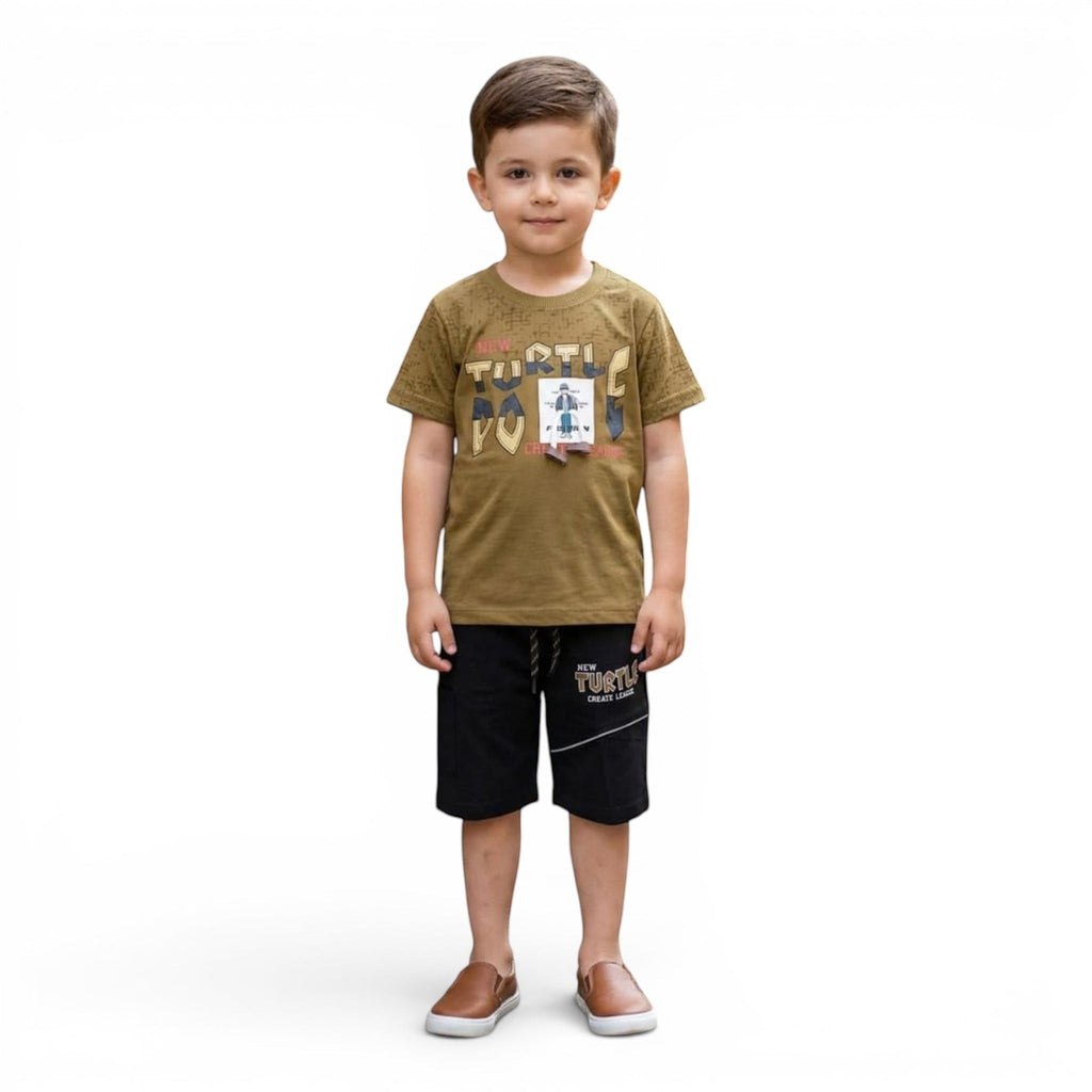 Mini & Mama olive green cotton t-shirt with turtle graphic and black shorts set for boys.