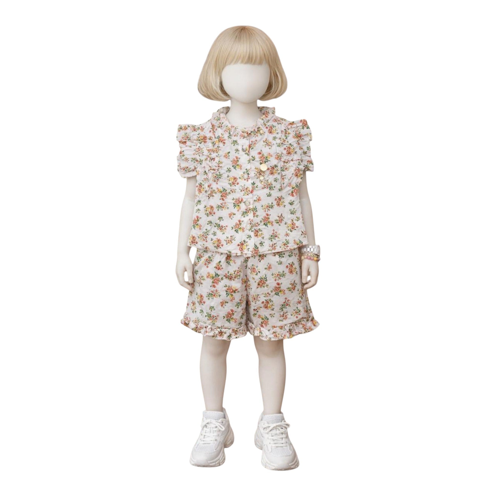 Mini & Mama Girls' white floral print pajama set with ruffle trim short sleeves and shorts.