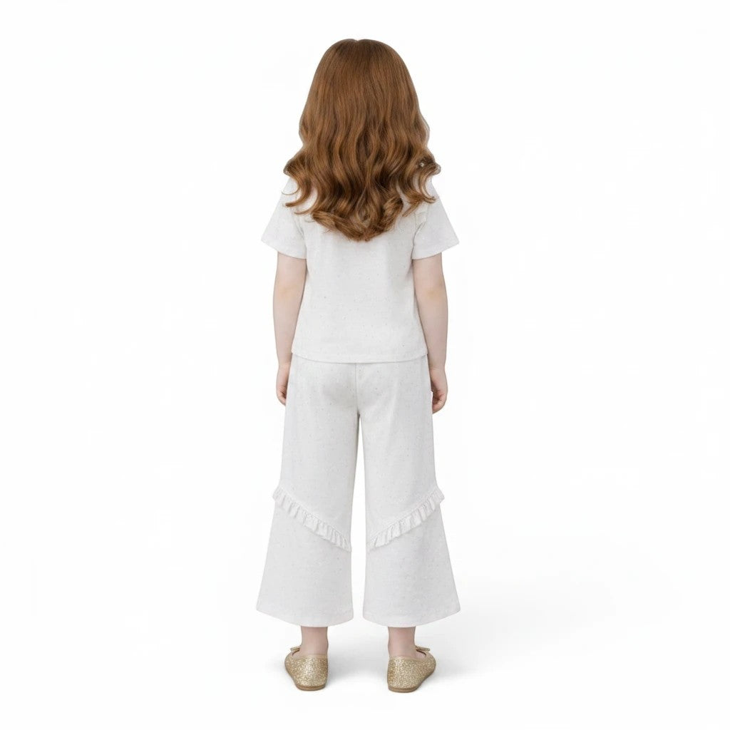 Mini & Mama girls' white ruffled two-piece outfit set with wide-leg pants and short sleeves.