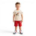 Mini & Mama toddler boys cream t-shirt with bear graphic and red shorts set. Soft, breathable fabric for comfort.