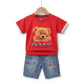 Mini & Mama Toddler Boys red t-shirt with teddy bear graphic and white trim, paired with light-wash denim shorts.