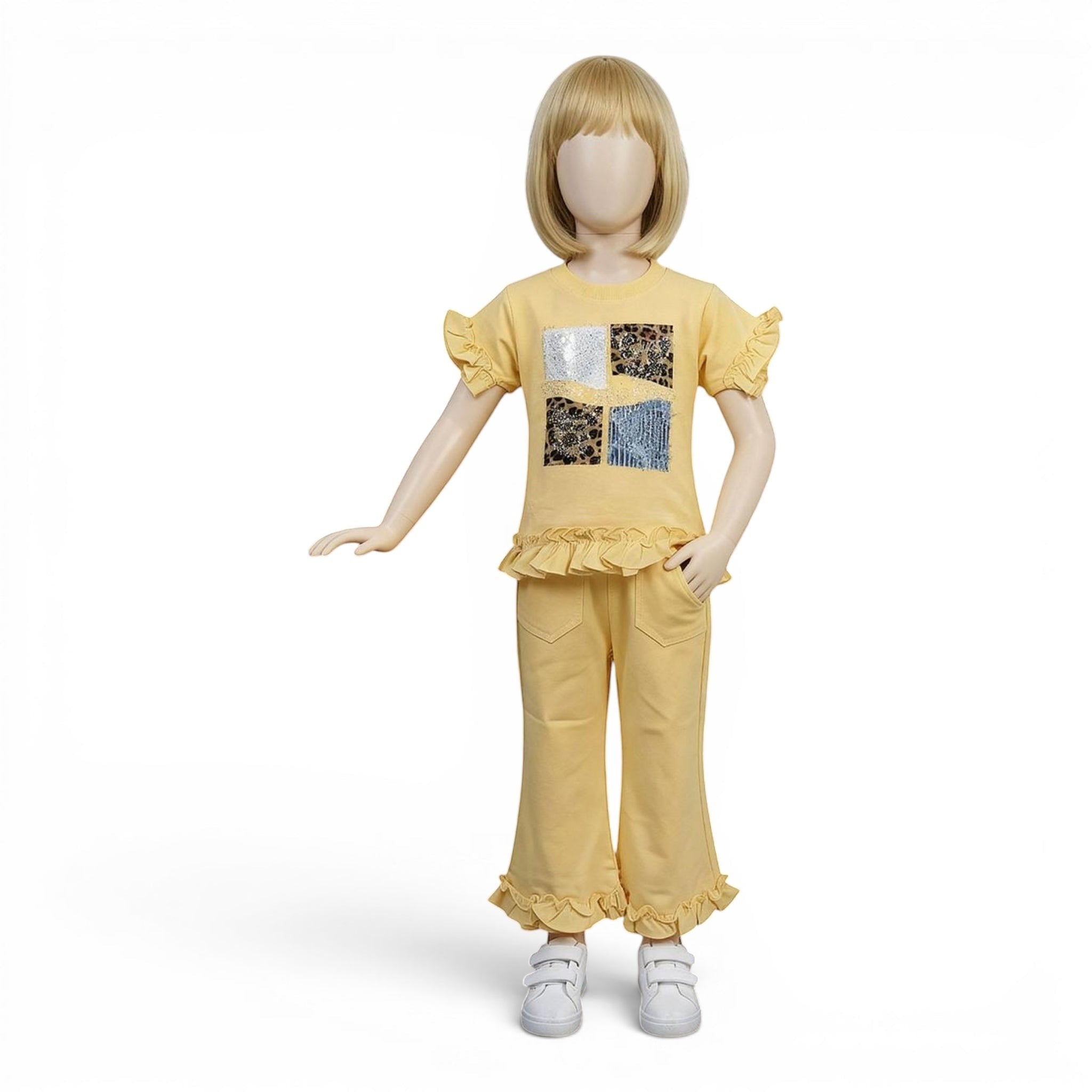 Mini & Mama yellow cotton patchwork top with ruffle sleeves and matching flare pants with ruffle hem. Girls outfit.