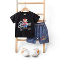 Mini & Mama boys black cotton t-shirt with bear graphic and denim shorts set. Elastic waistband.