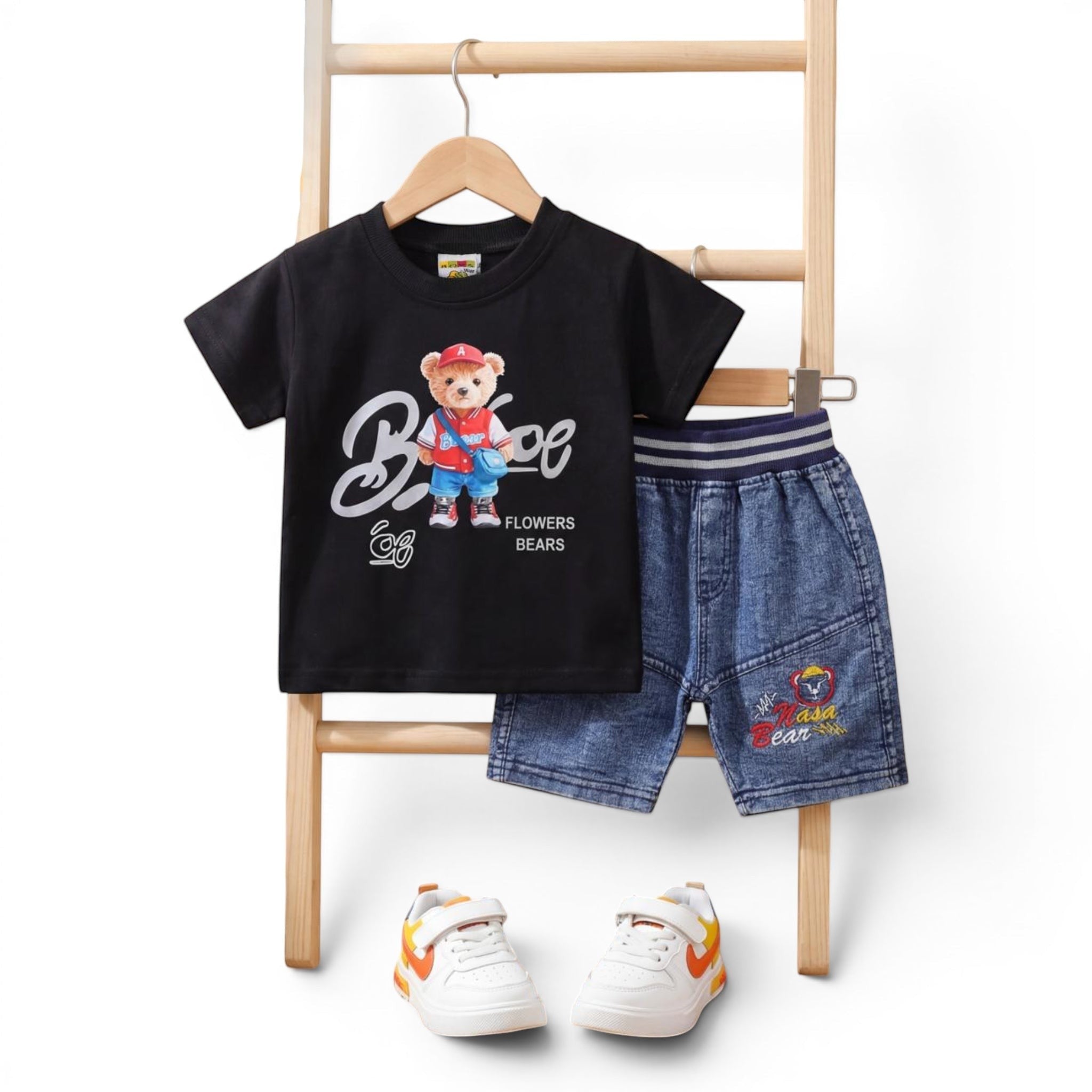 Mini & Mama boys black cotton t-shirt with bear graphic and denim shorts set. Elastic waistband.