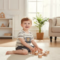 Mini & Mama boys' cream and grey striped t-shirt and shorts set with a bear graphic. Comfortable for everyday wear.