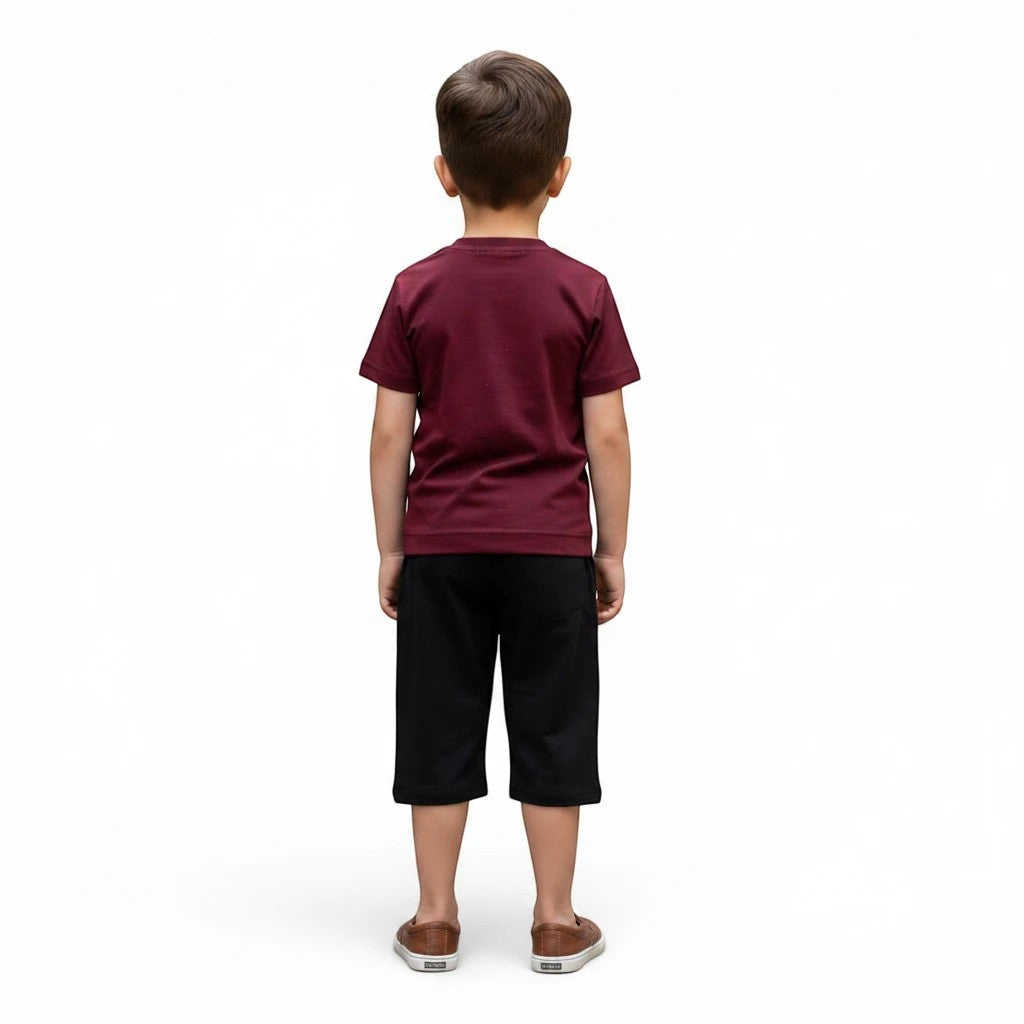 Mini & Mama boys burgundy cotton t-shirt and black shorts set. Casual short sleeve tee with crew neck and coordinating shorts with elastic waistband.