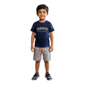 Mini & Mama boys navy blue cotton t-shirt with "FASHION Simple Elegant" graphic and grey shorts set.