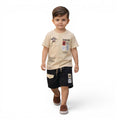 Mini & Mama boys beige graphic print t-shirt and black shorts set with elastic waistband and drawstring.