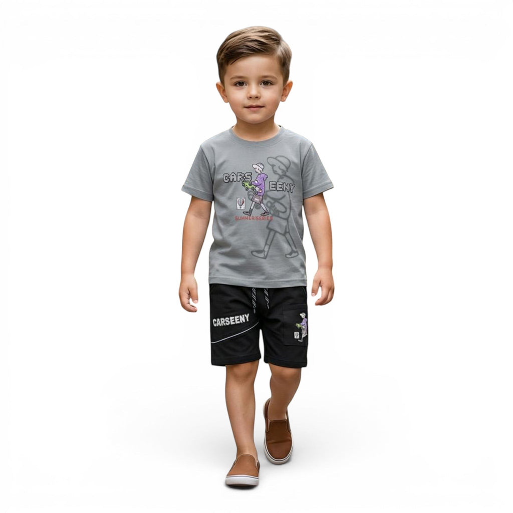 Mini & Mama boys grey graphic t-shirt and black shorts set. T-shirt has a cartoon car graphic. Shorts have an elastic waistband and drawstring.