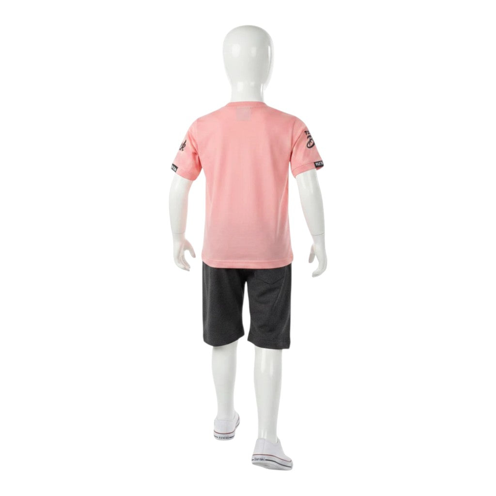 Mini & Mama Boys pink graphic t-shirt and charcoal grey shorts set. Short sleeves, elastic waistband, drawstring.