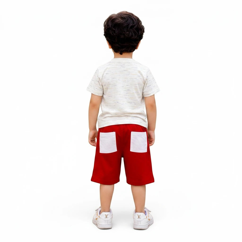 Mini & Mama Boys' cream graphic t-shirt and red shorts set with white pocket accents and piping.