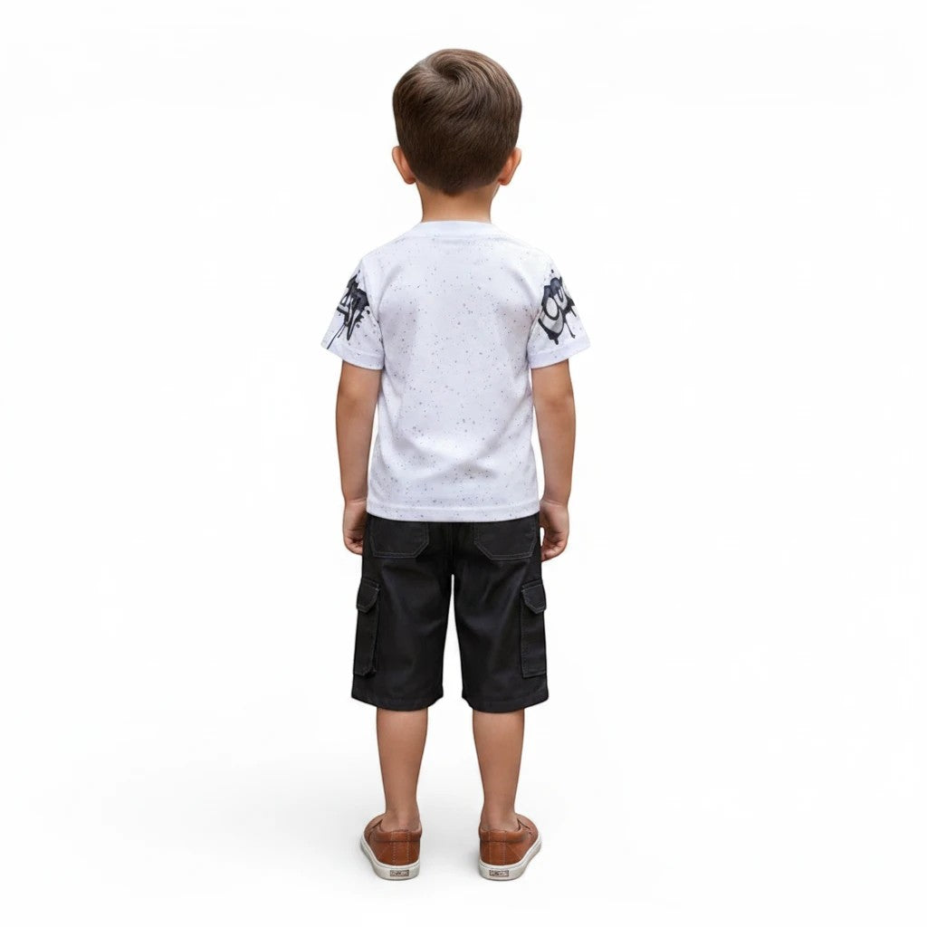 Mini & Mama boys' white graphic print t-shirt with speckled pattern and black cargo shorts.