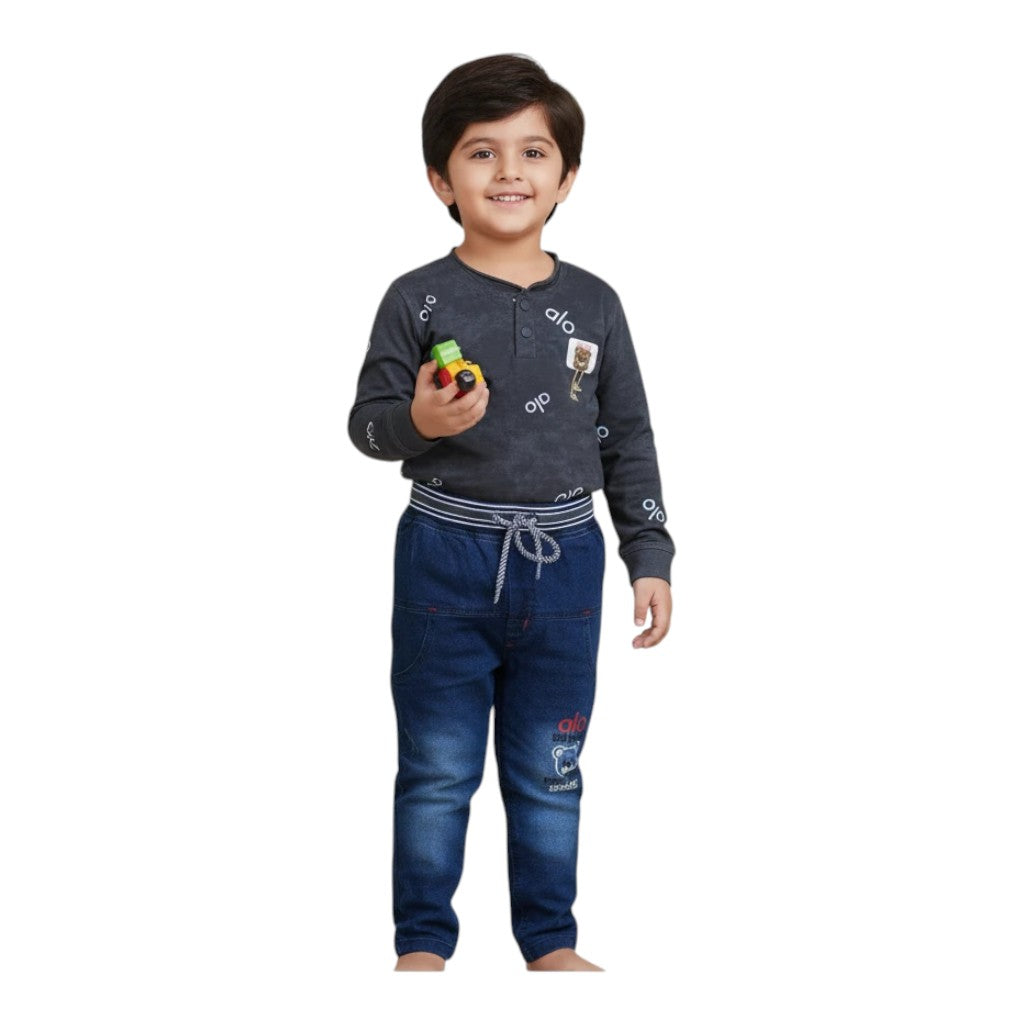 Mini & Mama boys' dark grey long sleeve t-shirt with graphic print and blue denim pants with drawstring waist and leg graphic.