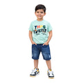 Mini & Mama boys mint green graphic t-shirt with "THG EVENT" text and distressed denim shorts.