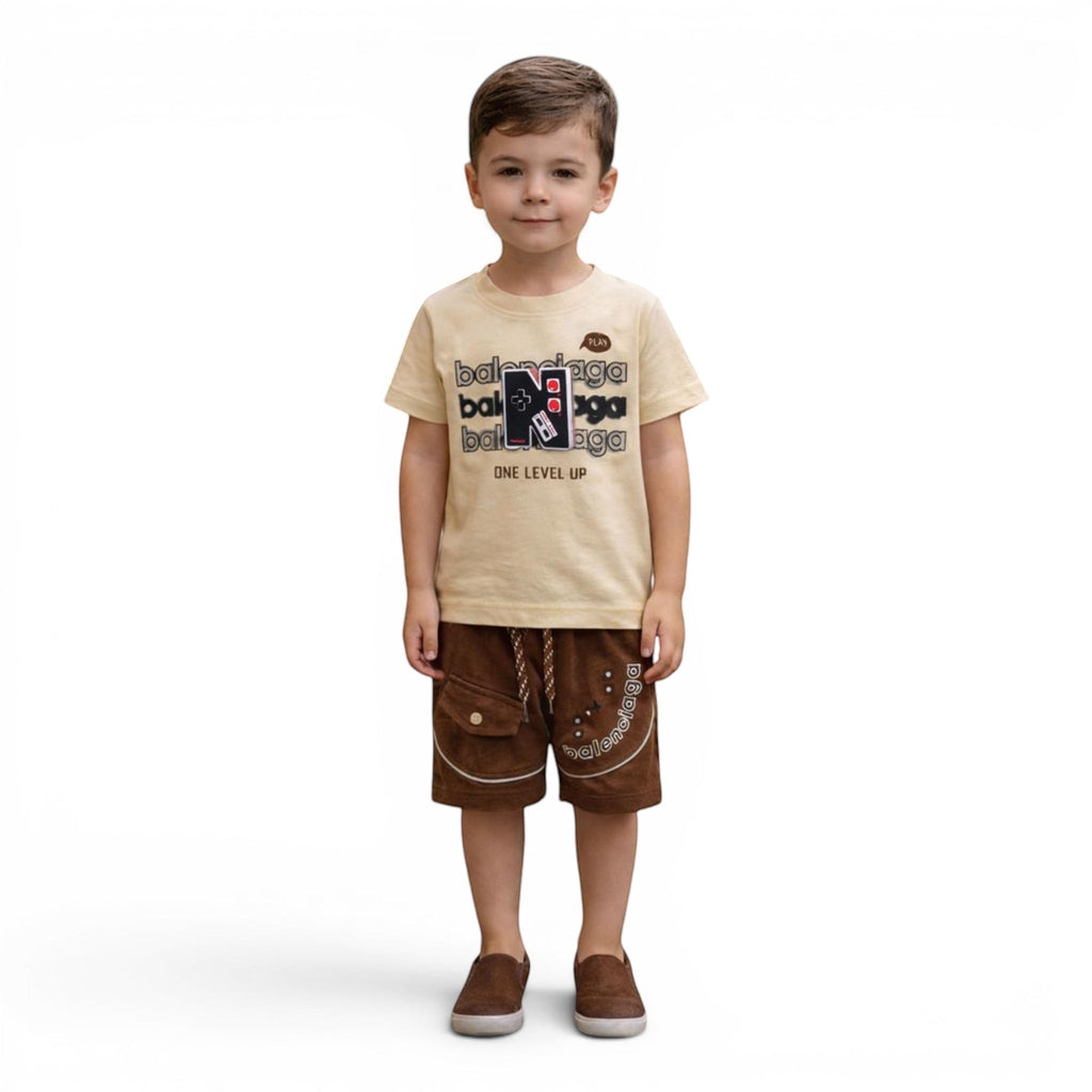 Mini & Mama boys' light beige cotton t-shirt with graphic print and brown terry cloth shorts. Features game controller graphic.