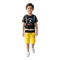 Mini & Mama boys black graphic t-shirt with colorful sleeve stripes and yellow shorts with drawstring waist.