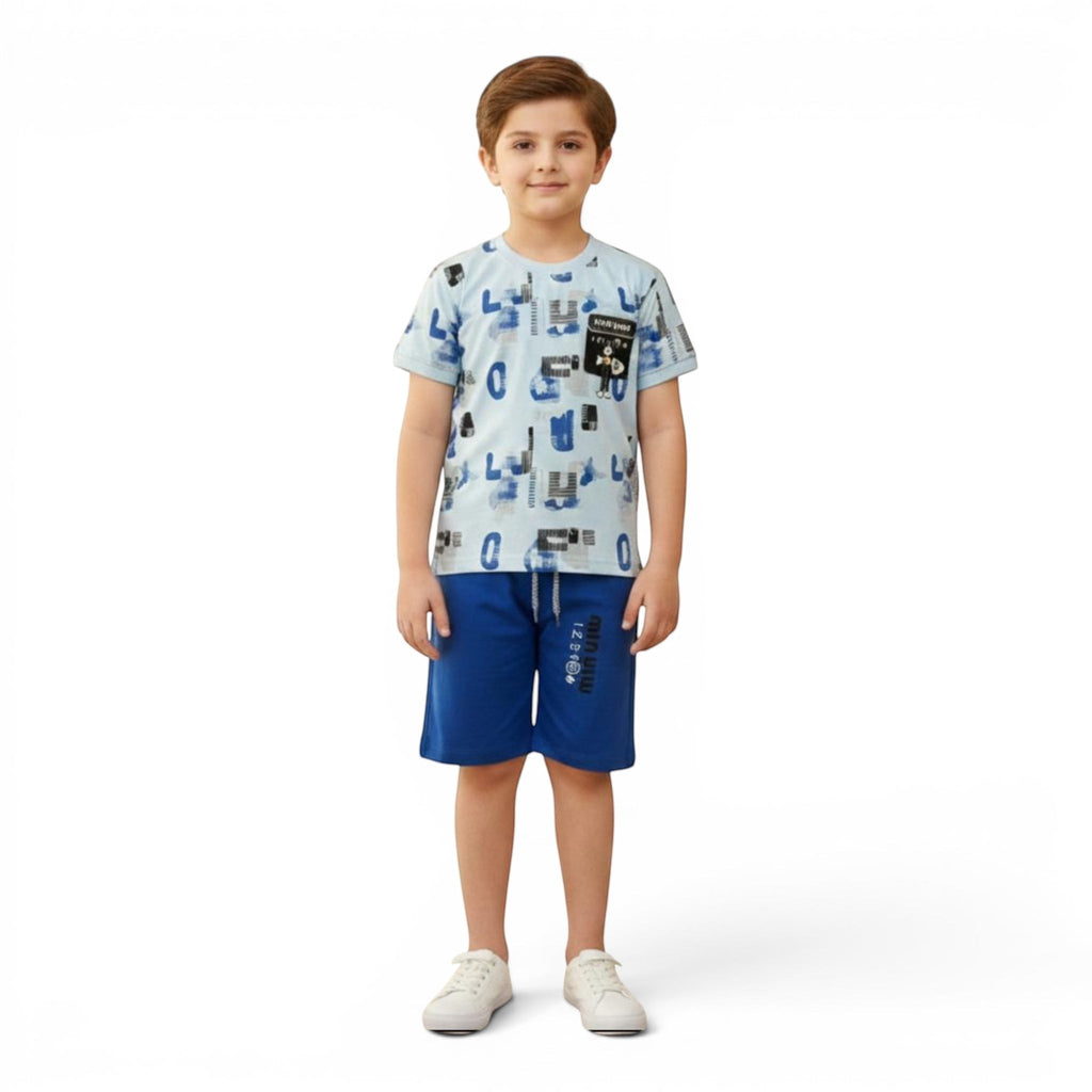 Mini & Mama light blue graphic t-shirt and royal blue shorts set for boys. Cotton blend with abstract print and drawstring waist.