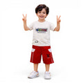 Mini & Mama Boys' cream graphic t-shirt and red shorts set with elastic waistband and white pocket accents.