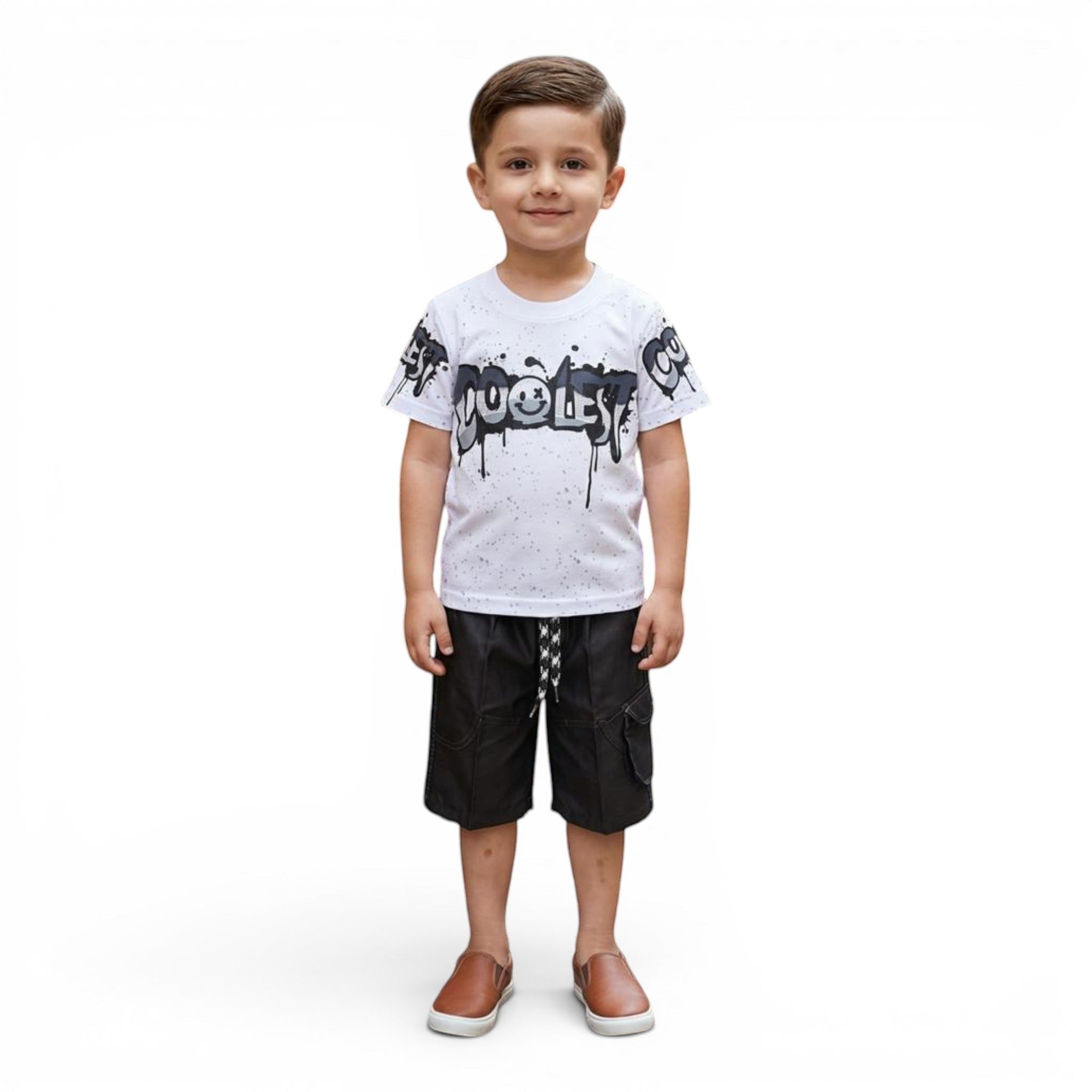 Mini & Mama boys white cotton t-shirt with black graphic print and black cargo shorts. Features smiley face detail.