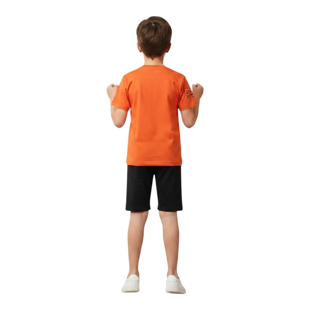 Mini & Mama boys' bright orange cotton graphic t-shirt and black shorts set. Features graphic print on shirt and shorts.