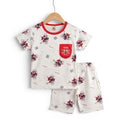 Mini & Mama boys' white Spider-Man pajama set with red trim, chest pocket, and all-over mask print. Includes shorts.
