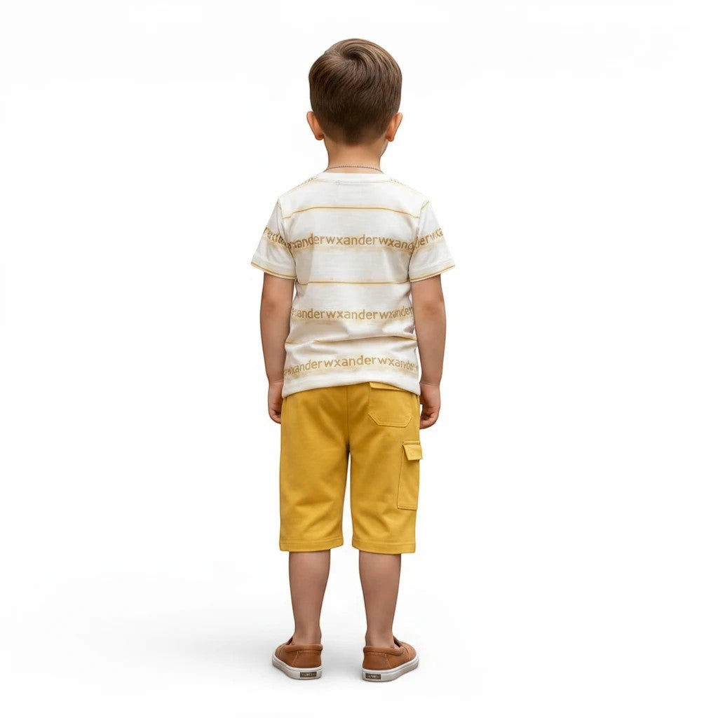 Mini & Mama Boys striped t-shirt and yellow cargo shorts set. T-shirt has horizontal stripes and graphic print. Shorts have drawstring waist and cargo pocket.