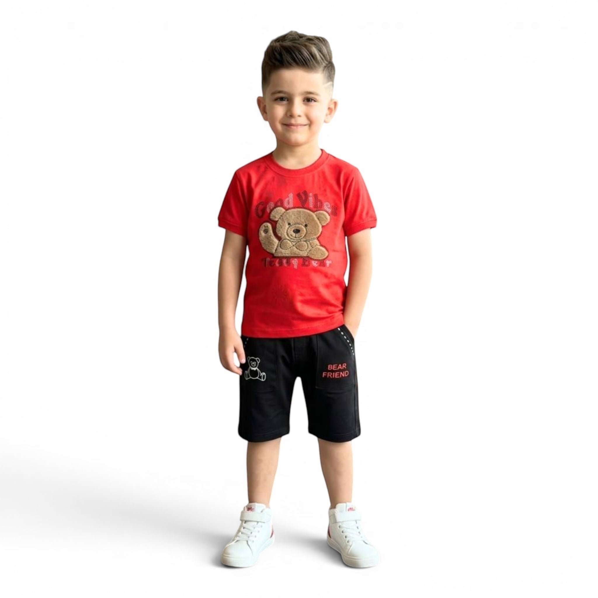 Mini & Mama boys red cotton t-shirt with teddy bear graphic and black shorts with "Bear Friend" text. Elastic waistband.