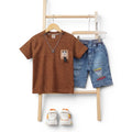 Mini & Mama boys' brown textured t-shirt with Mickey Mouse graphic and blue denim shorts set.