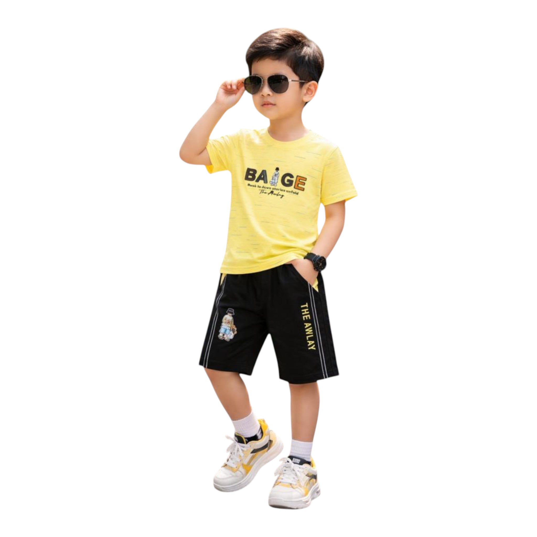 Mini & Mama Boys yellow graphic t-shirt and black shorts set. T-shirt has textured pattern. Shorts have graphic detail and side stripe.
