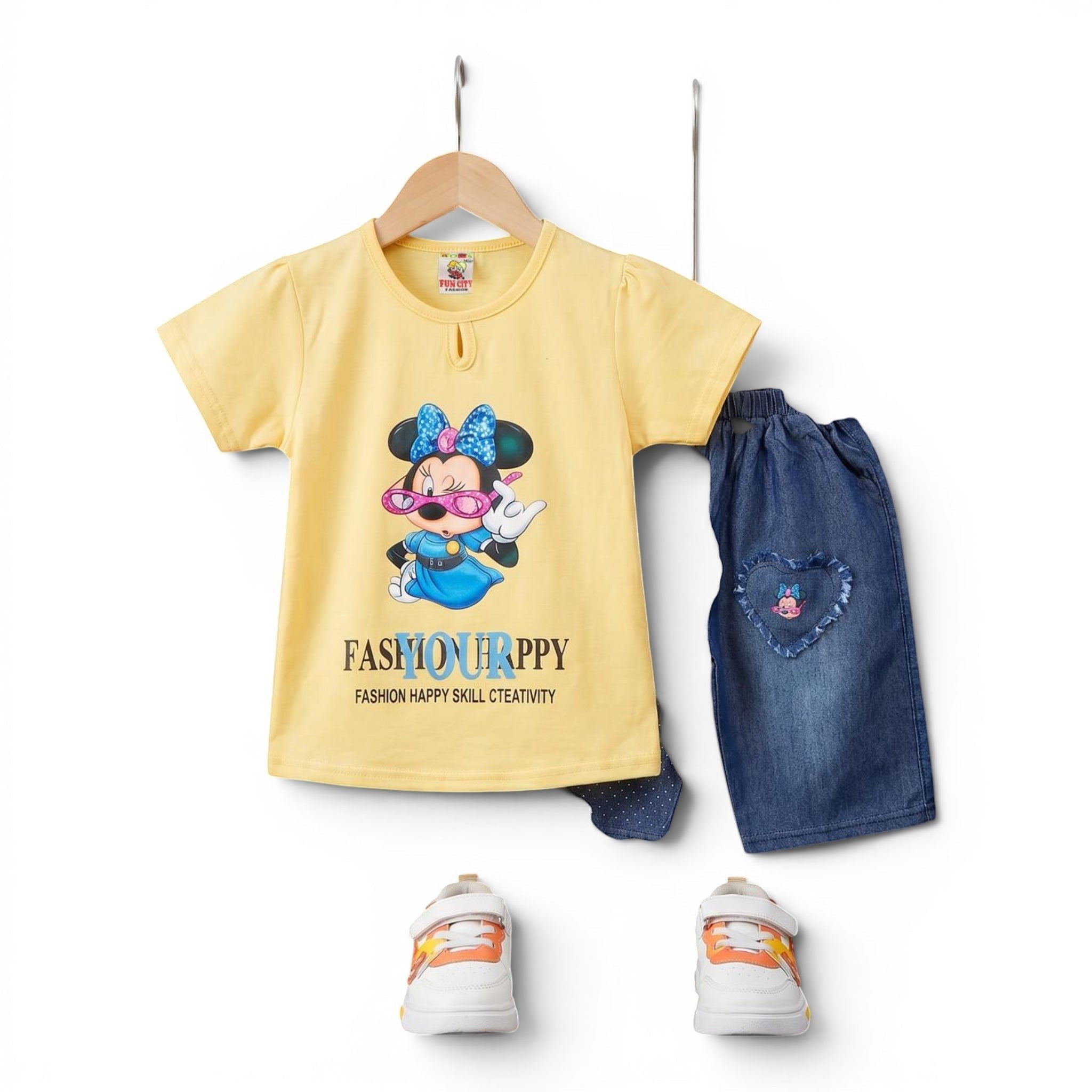 Mini & Mama Girls yellow cotton t-shirt with Minnie Mouse graphic and denim shorts with heart patch.