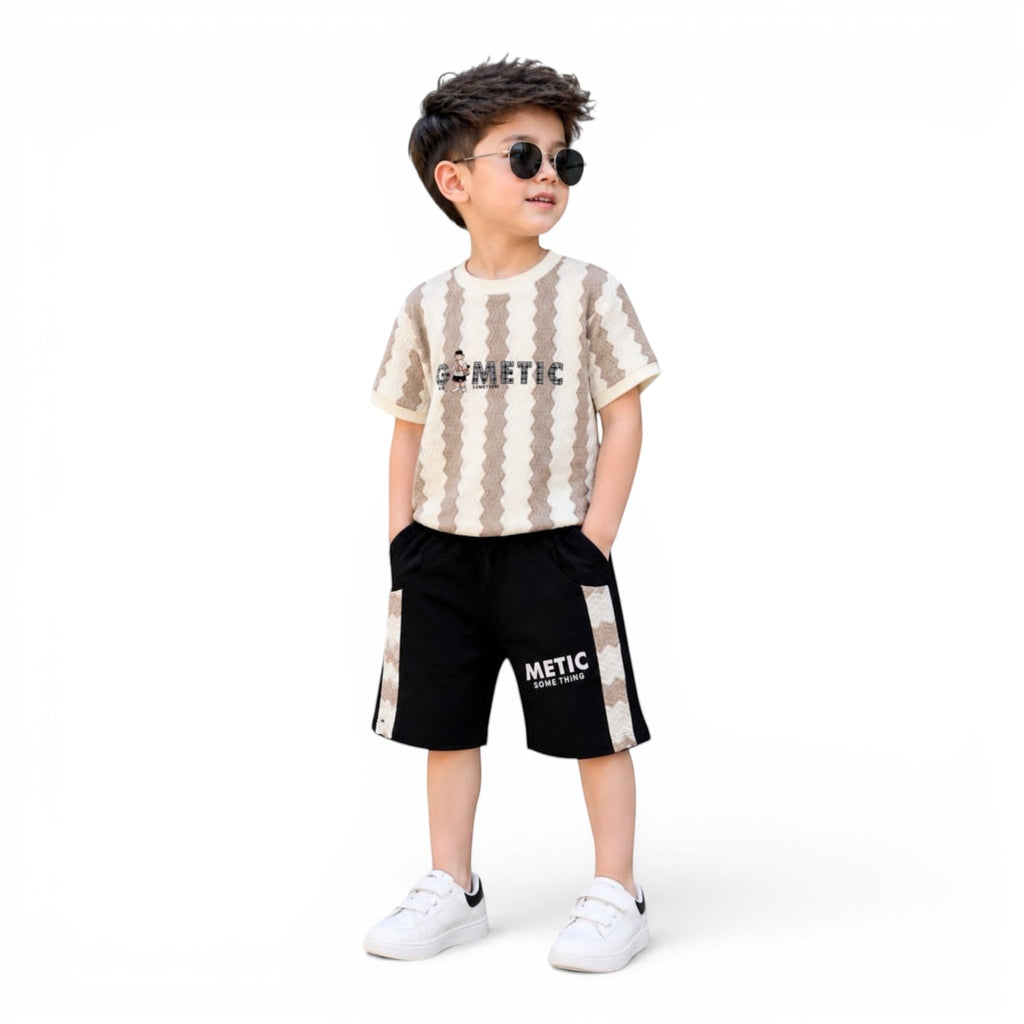 Mini & Mama Kids beige and brown geometric print t-shirt with black shorts set. Features text graphics.