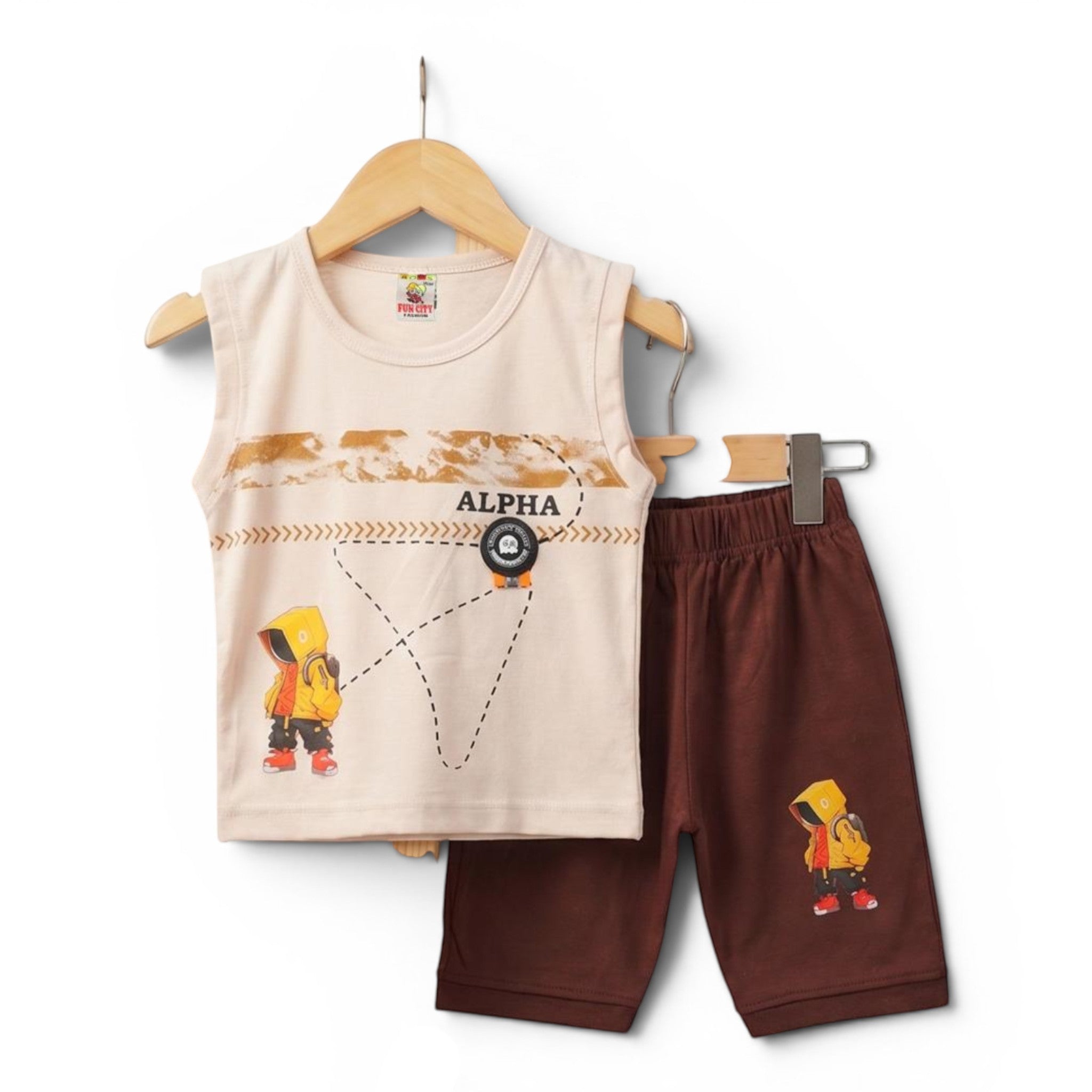 Mini & Mama kids graphic print sleeveless top and brown shorts set. Cream top with graphic print and "ALPHA" text. Brown shorts with graphic print.