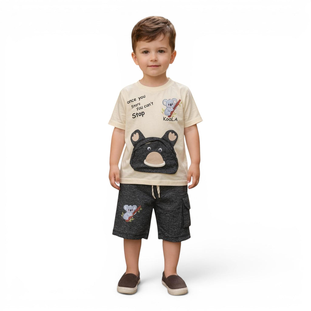 Mini & Mama cream t-shirt with koala graphic and charcoal grey cargo shorts set for kids. Features drawstring waist and multiple pockets.
