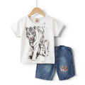 Mini & Mama white cotton t-shirt with tiger graphic and blue denim shorts set for kids.
