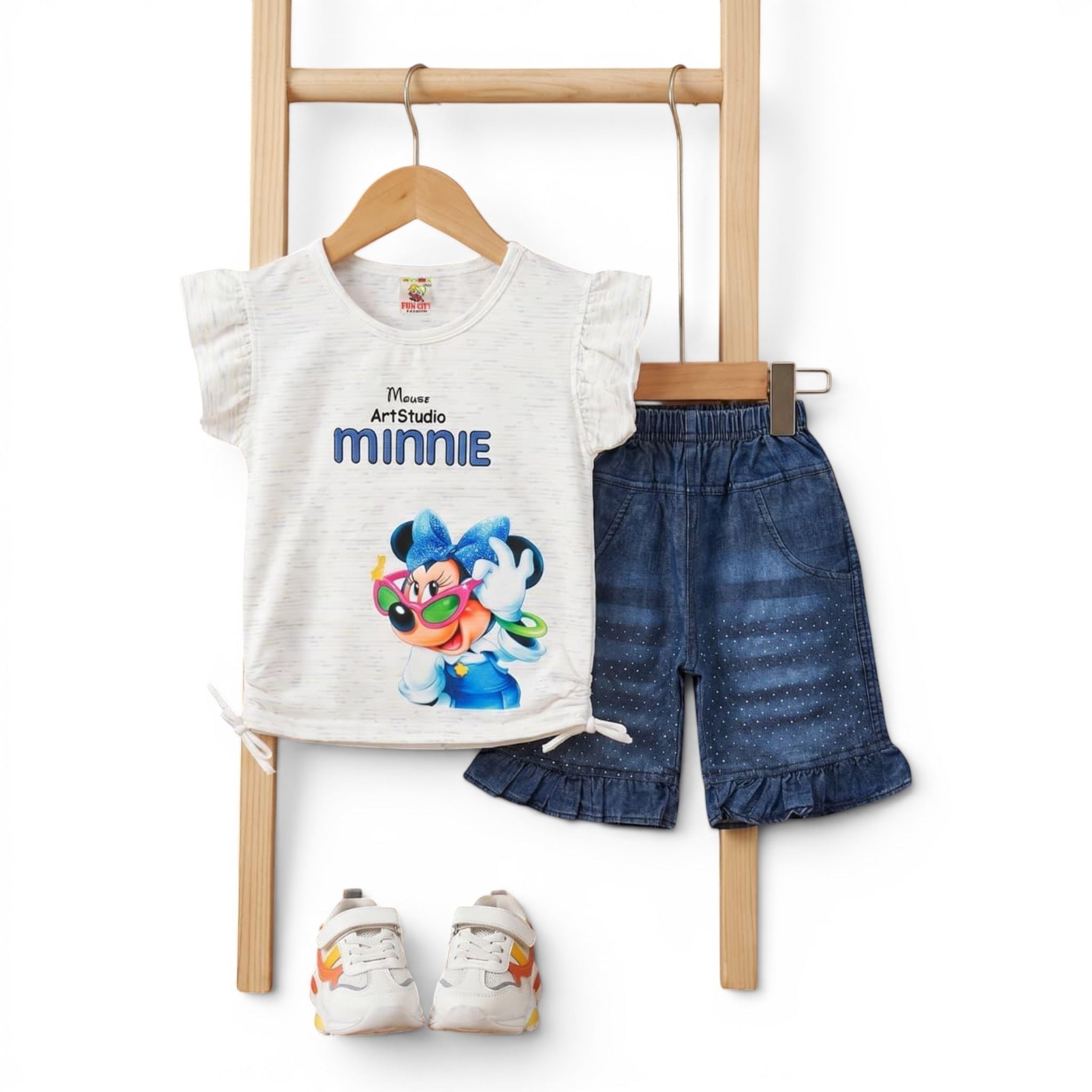 Mini & Mama toddler girls white graphic tee with Minnie Mouse and denim shorts with polka dots. Ruffled sleeves and hems.